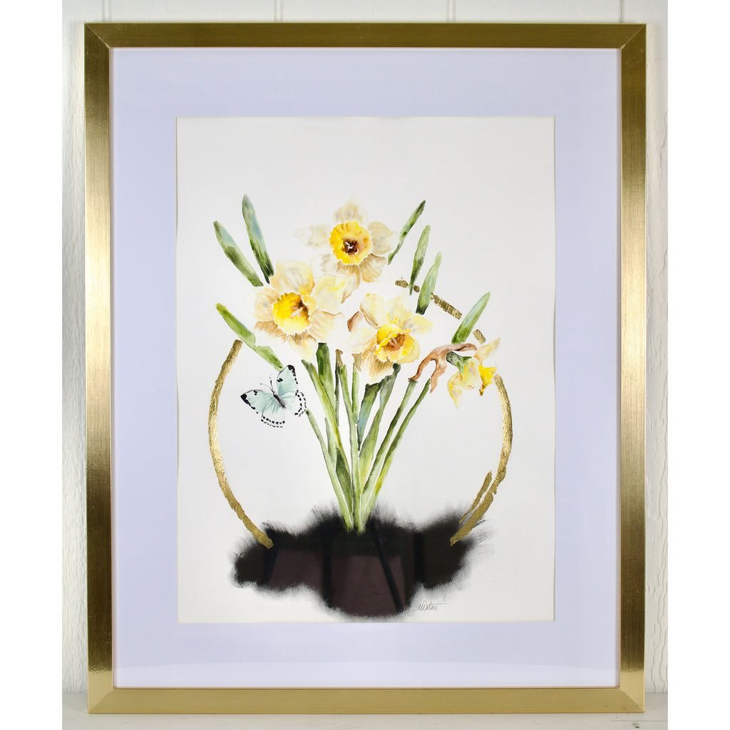 Framed artwork of a bouquet of flowers with a gold frame.