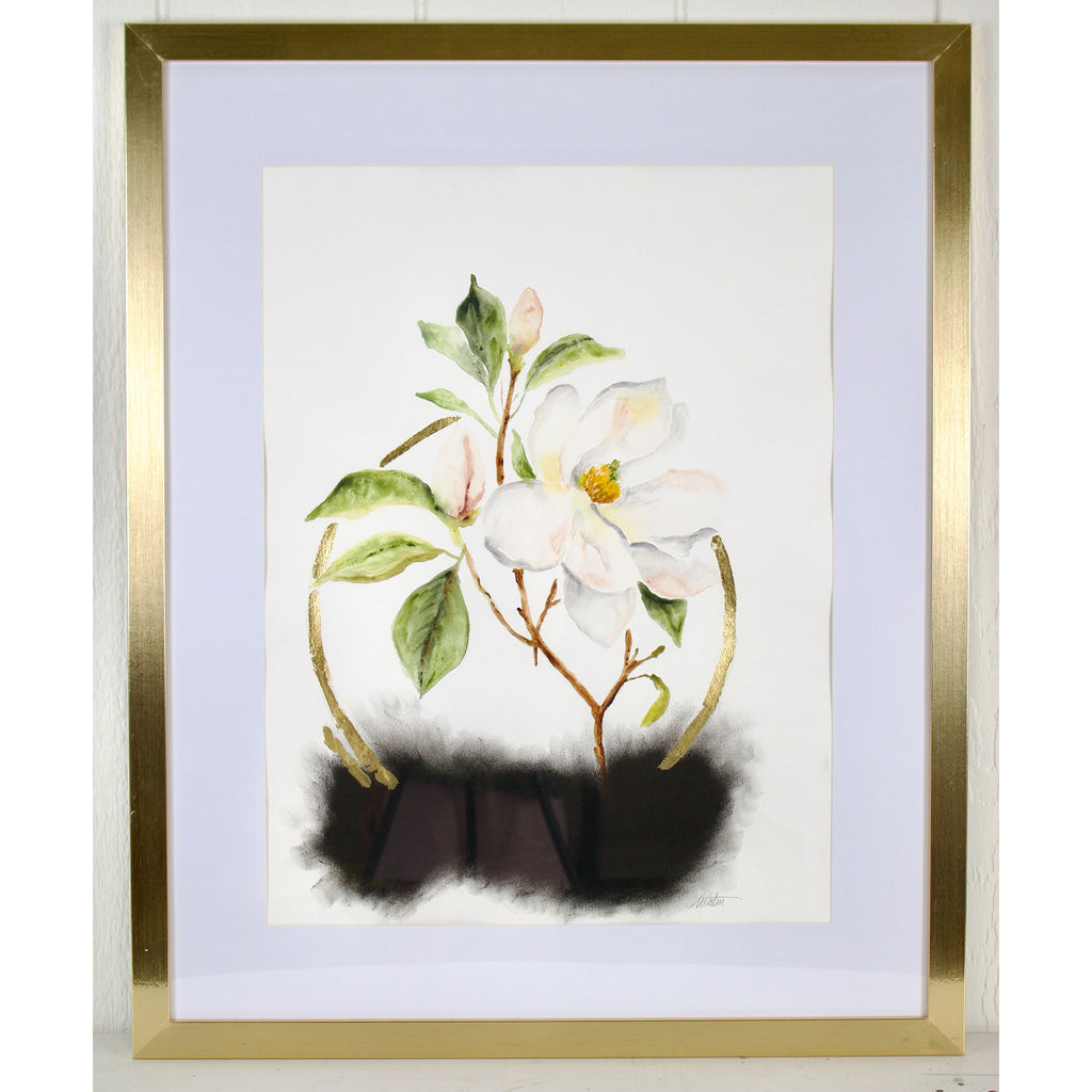 Framed artwork of a white flower with green leaves on a light background