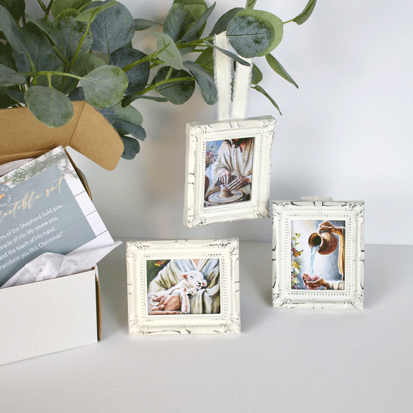 Rustic white mini framed collectible set by Mindi Oaten featuring The Good Shepherd, The Potter’s Hand, and Water to Wine — The Touch of His Hands collection.