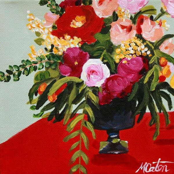

Feel the Heat by Mindi Oaten, showing red, pink and yellow flowers with cascading leaves in a dark vase.